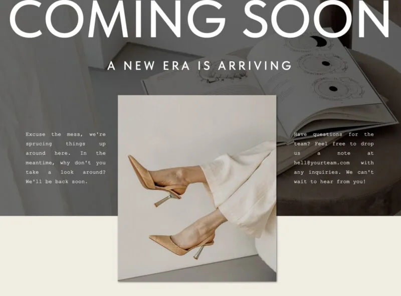 "Minimalist 'Coming Soon' landing page design with neutral tones, featuring a centered image of a woman’s legs in beige heels, surrounded by clean text areas announcing a new website launch and contact information."