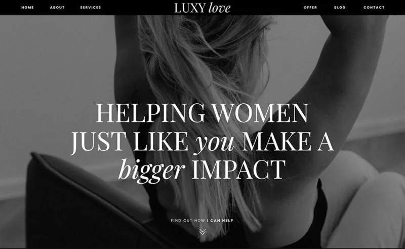 Homepage of the Luxy Love free Showit template featuring a black-and-white photo of a woman with her back turned, overlaid with bold serif text that reads “Helping women just like you make a bigger impact,” and a minimalist navigation menu at the top.